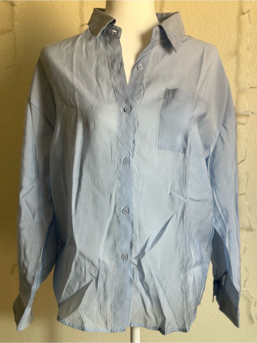 Light Blue Women's Button-Down Shirt with Chest Pocket and Tie at the back